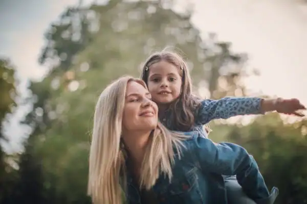 happy mum and daughter following mediation to resolve parental alienation Cheltenham